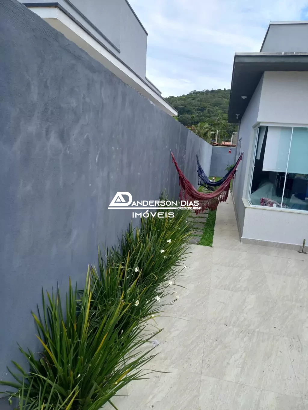 Casa com 2 dormitórios a venda com  67 m² por R$ 498 mil- Massaguaçu- Caraguatatuba/SP