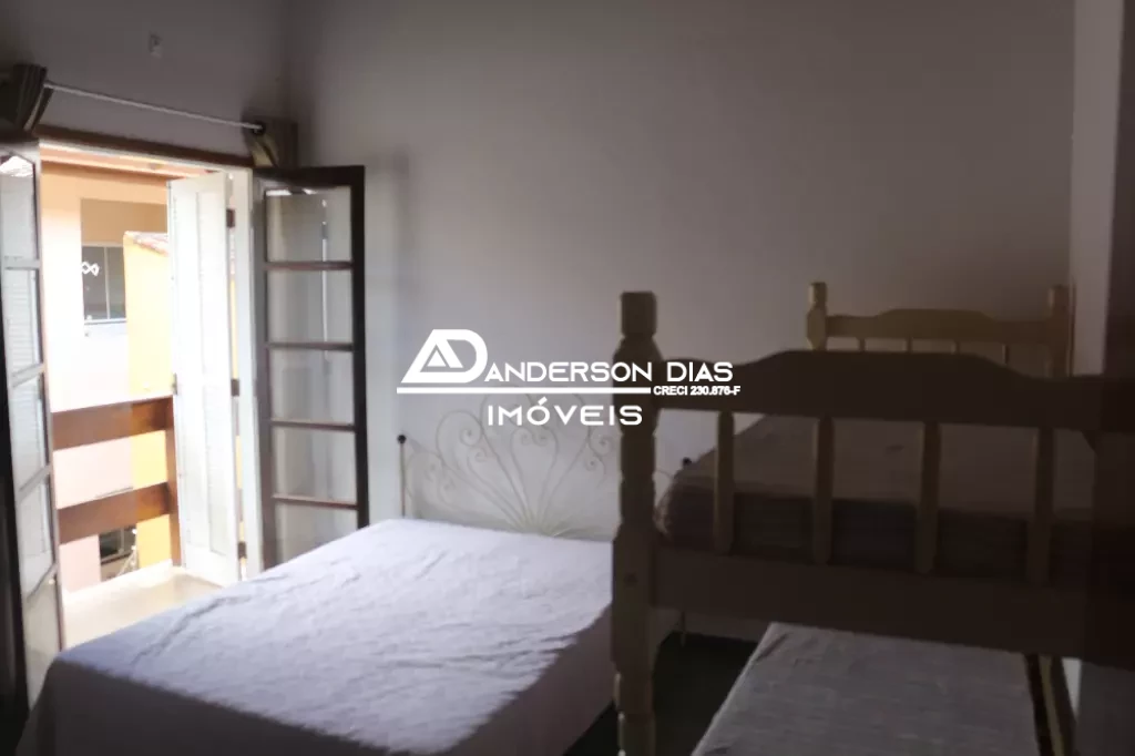 Sobrado em condomínio fechado com 2 dormitórios à venda, 80 m² por R$ 330.000 - Massaguaçu - Caraguatatuba/SP