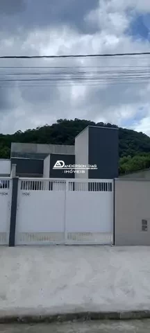 Casa com 2 dormitórios à venda, 68 m² por R$ 320.000 - Massaguaçu - Caraguatatuba/SP
